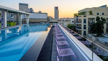 Seasonal outdoor pool, free pool cabanas, pool umbrellas