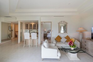 Executive Suite, 1 King Bed, Bay View | Living area | TV, foosball, table tennis