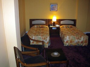 Standard Room, City View | Minibar, free cribs/infant beds, rollaway beds