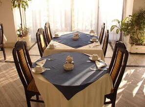 Breakfast, lunch, dinner served; local cuisine 