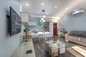 Suite | Living area | 46-inch LCD TV with satellite channels, TV - Fallsway Suites (Lusaka)