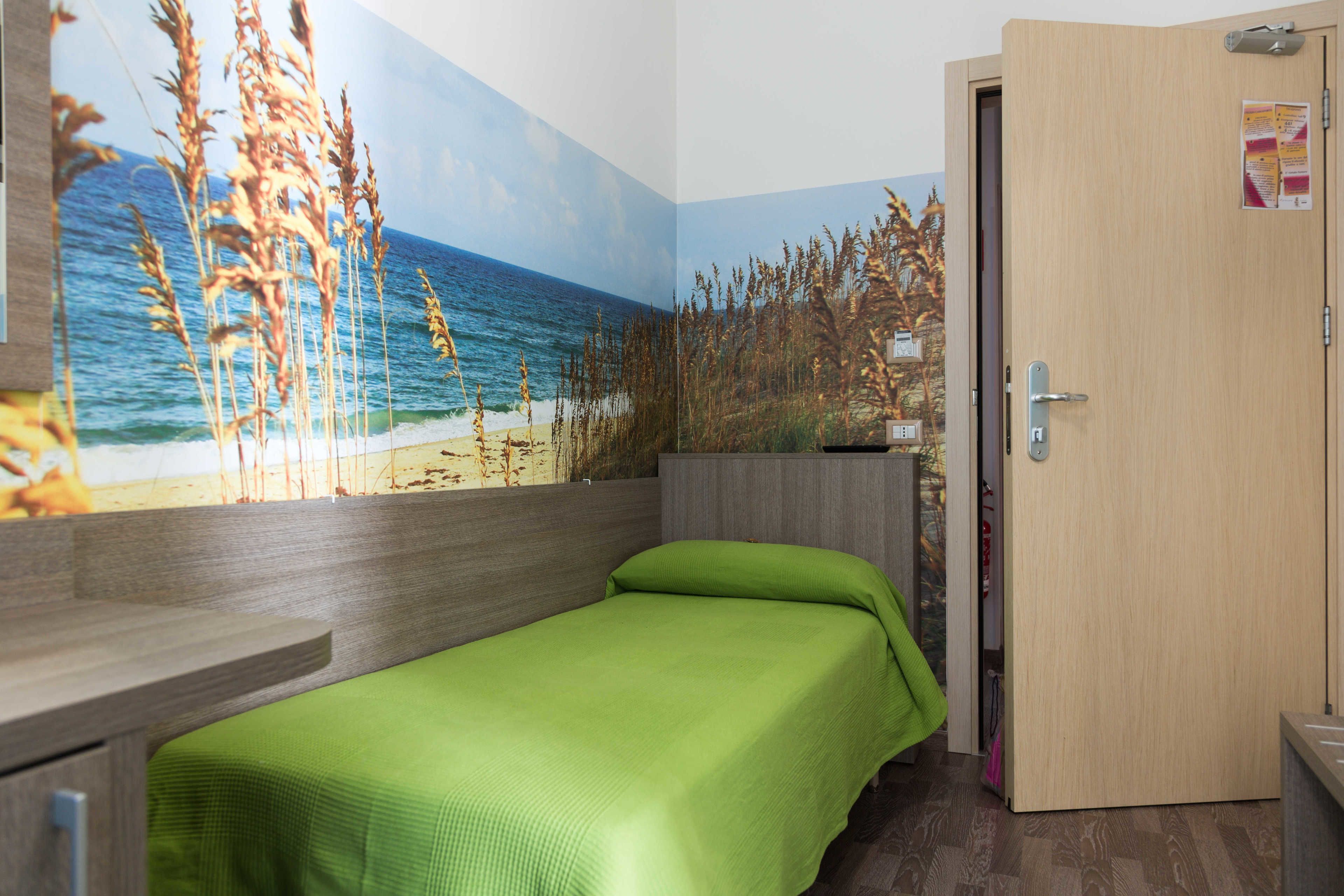 comfort single room, 1 single bed, accessible, terrace | minibar, in-room safe, desk, laptop workspace