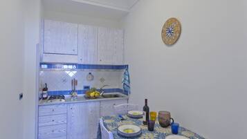Comfort Triple Room, 1 Bedroom, Ocean View | Private kitchen | Electric kettle