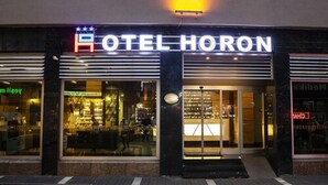 The exterior of HOTEL HORON with a prominent illuminated sign. - Horon Hotel (Trabzon)