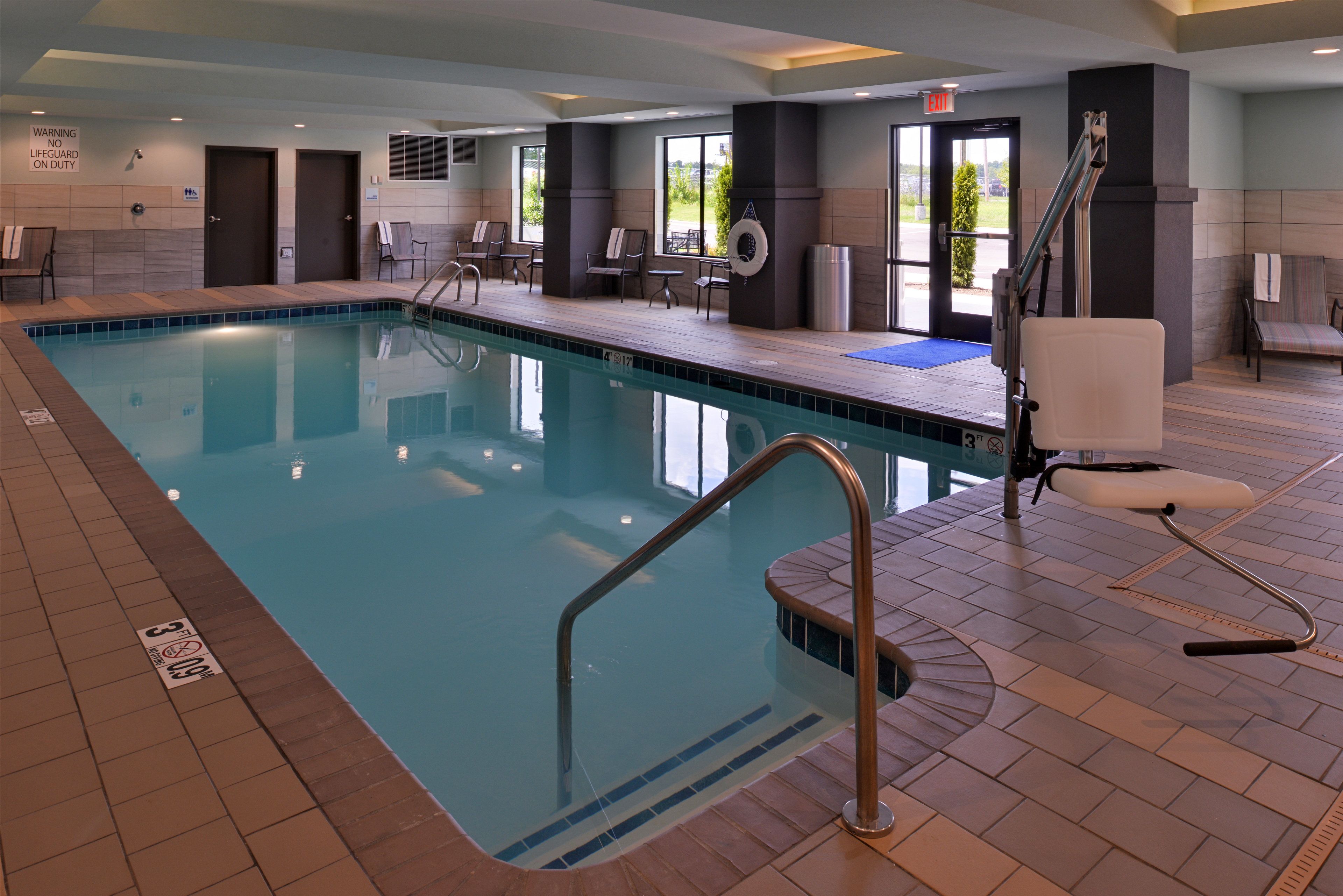 indoor pool, open 9:00 am to 9:00 pm, pool loungers