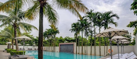 Indoor pool, outdoor pool, pool umbrellas