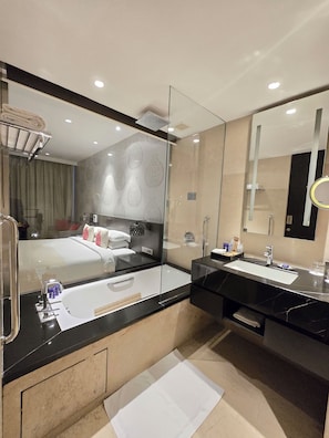 Combined shower/tub, deep soaking tub, free toiletries, hair dryer