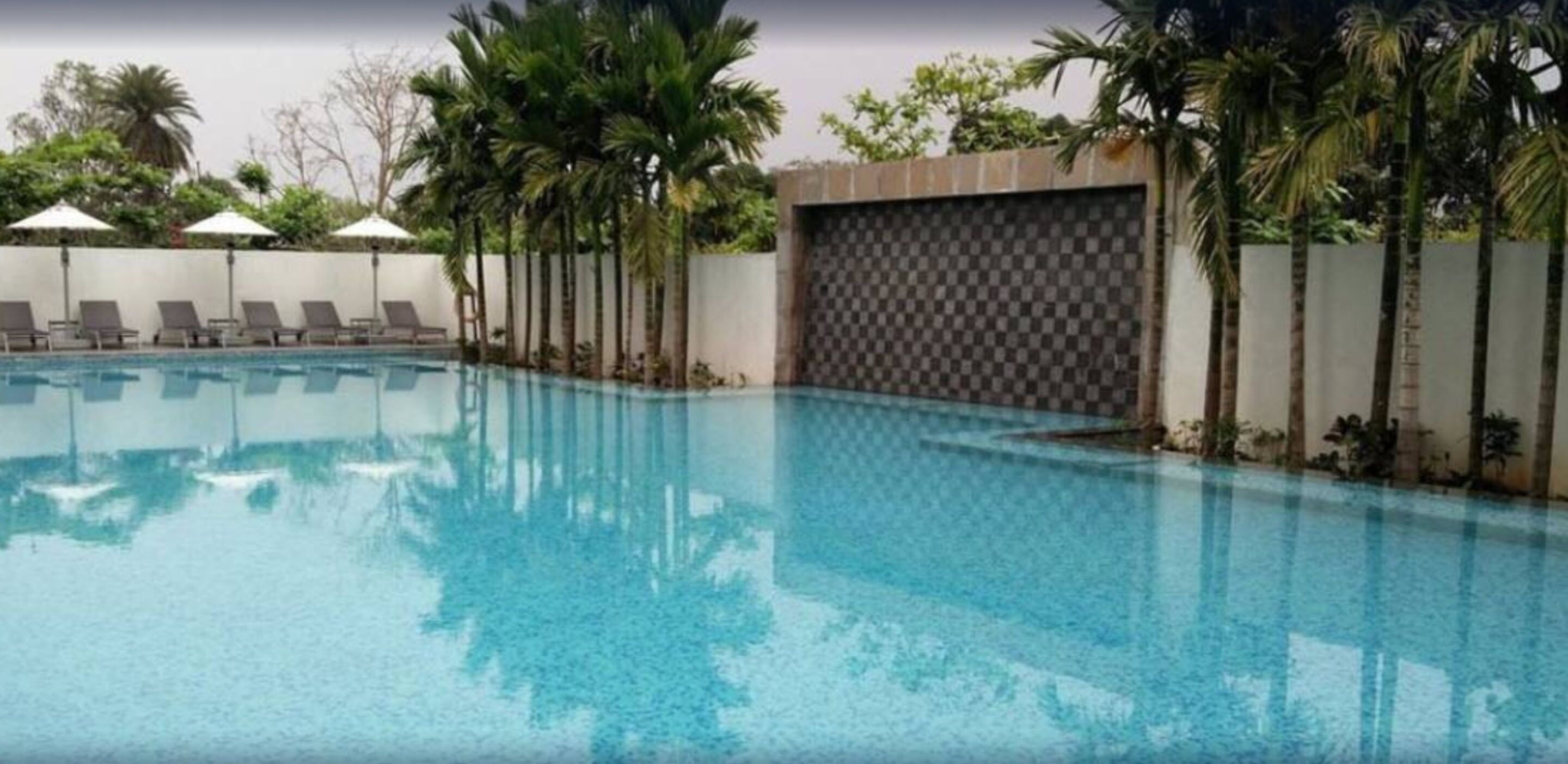 indoor pool, outdoor pool, pool umbrellas