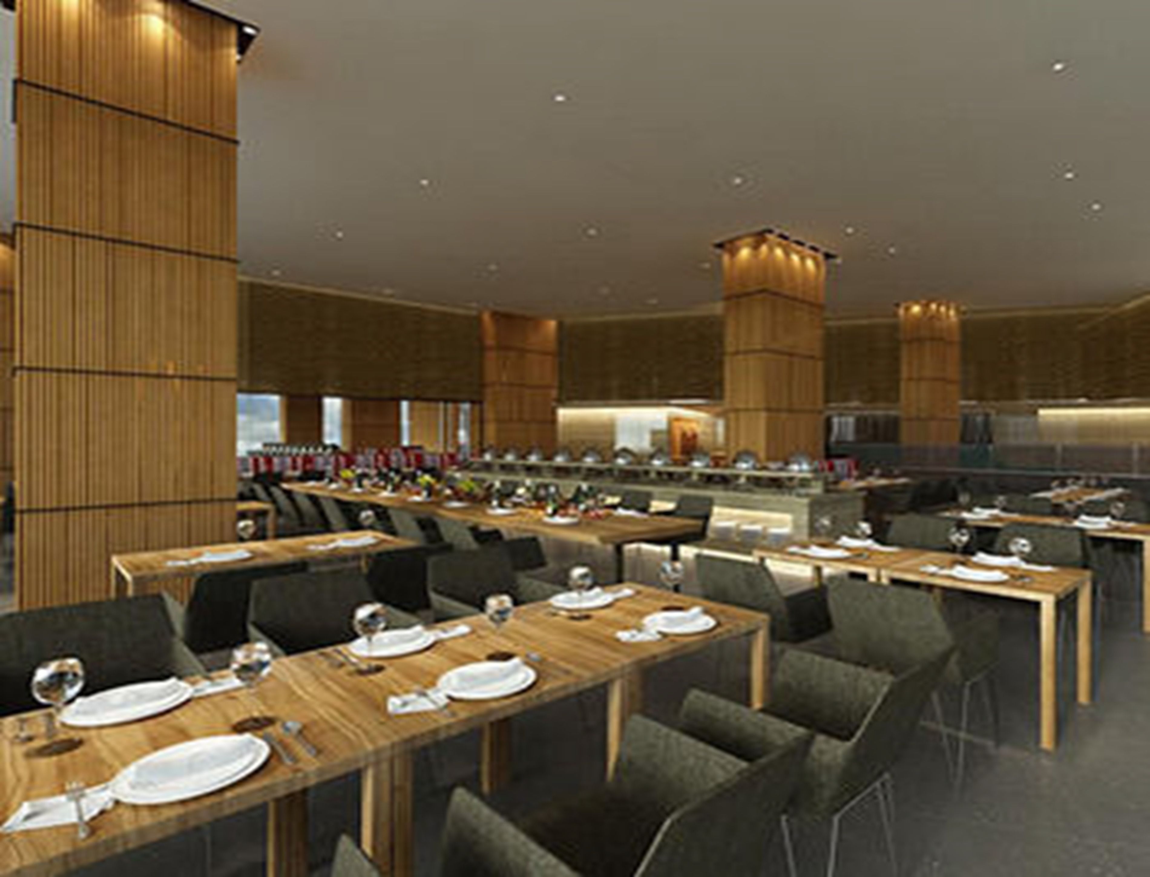 A modern dining area with multiple tables and chairs, wooden paneling on the walls, and a central light fixture.