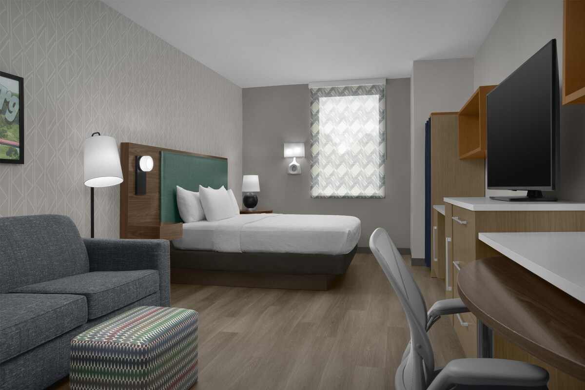 Premium bedding, pillow-top beds, desk, laptop workspace