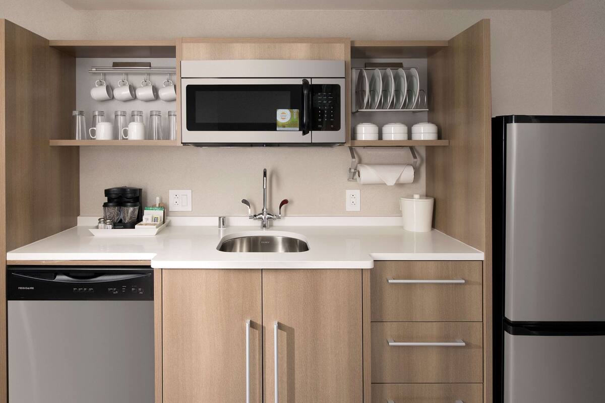 full-sized fridge, microwave, dishwasher, coffee/tea maker