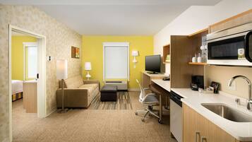 Premium bedding, pillowtop beds, desk, laptop workspace