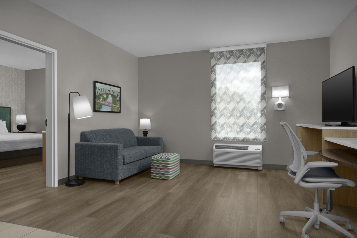 Suite, 1 Bedroom, Non Smoking | Living area | 55-inch flat-screen TV with cable channels, TV