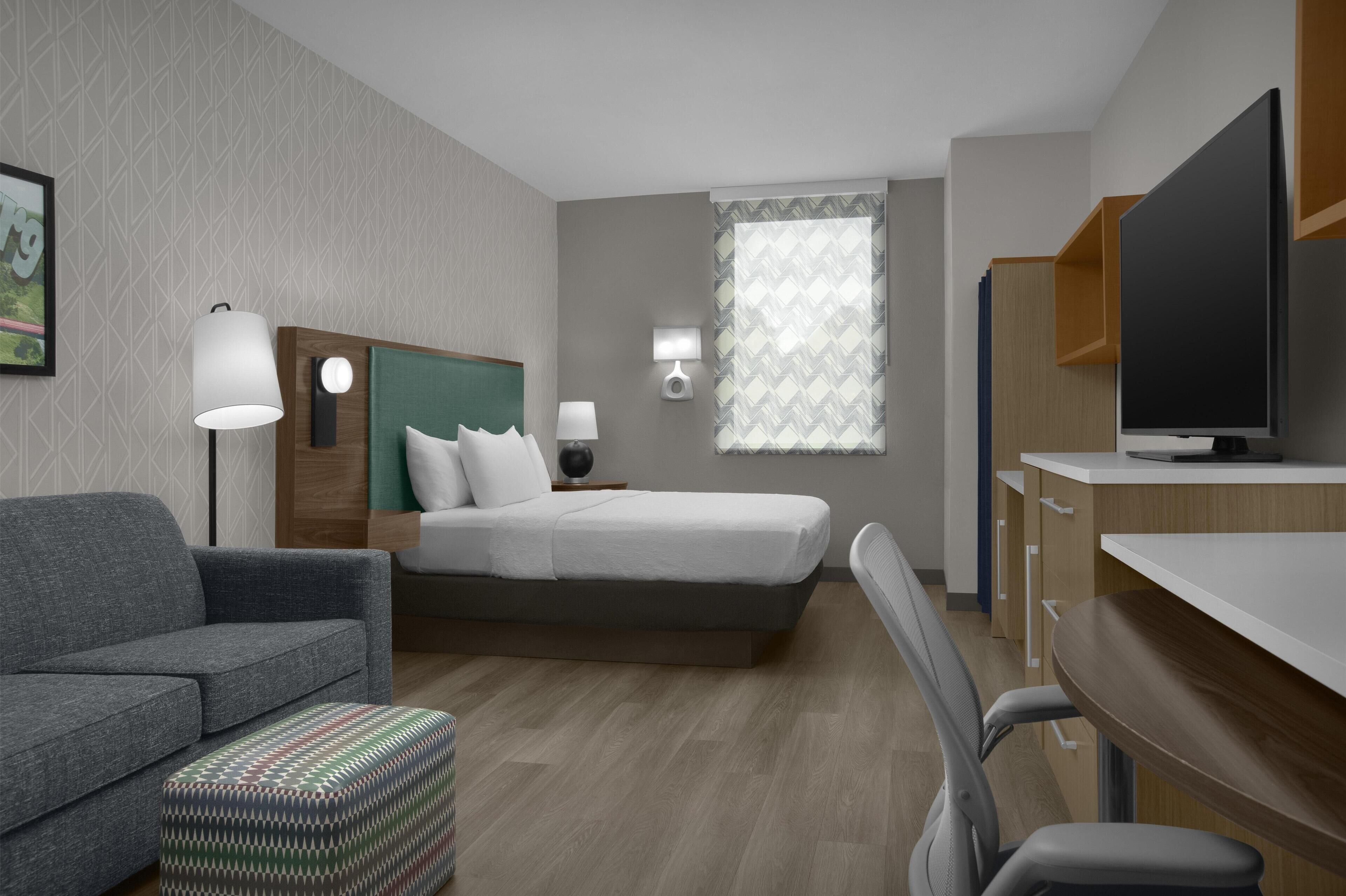 Premium bedding, pillowtop beds, desk, laptop workspace