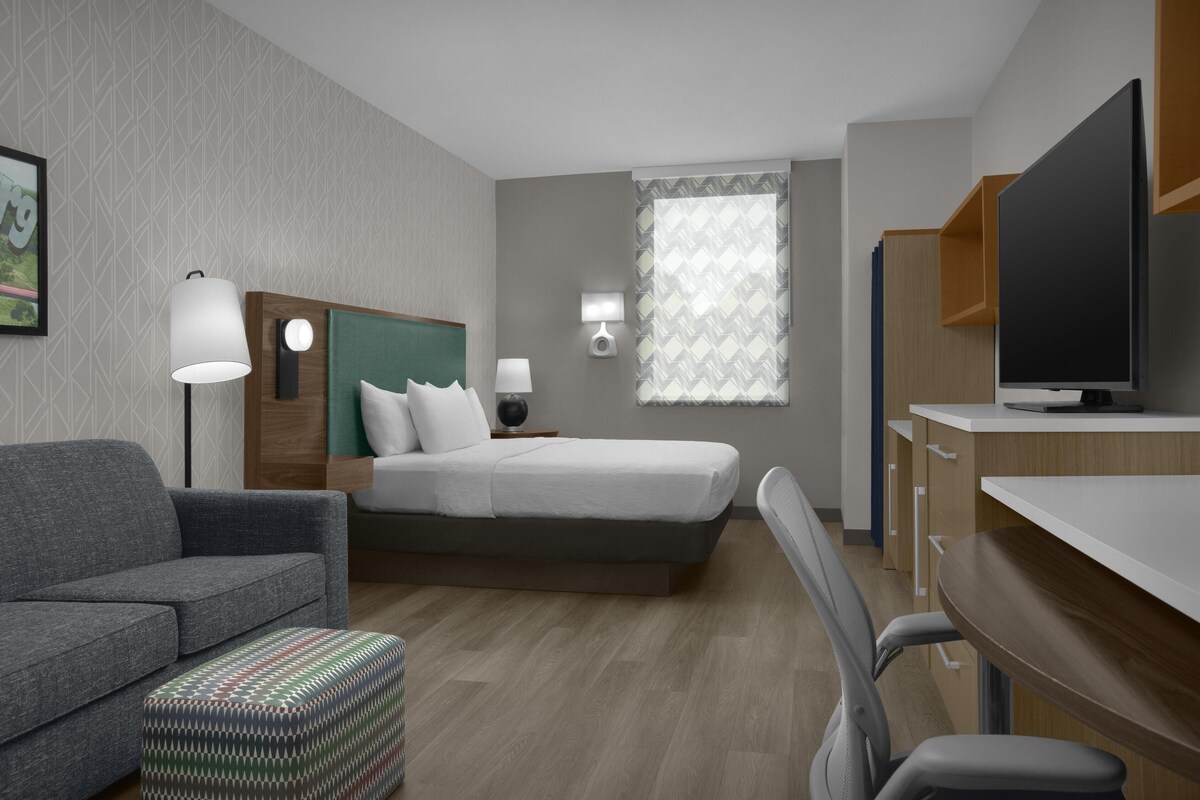 Premium bedding, pillow-top beds, desk, laptop workspace