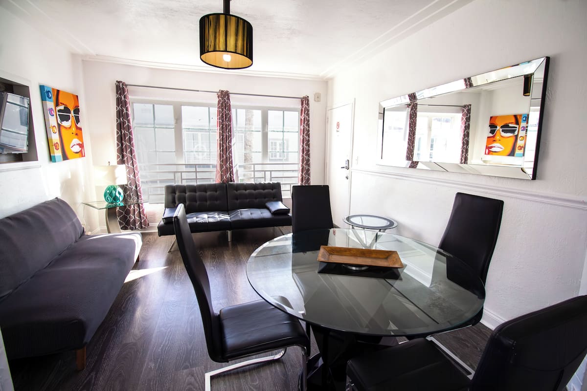 Deluxe Apartment, 2 Bedrooms | Living area | 32-inch flat-screen TV with cable channels, TV