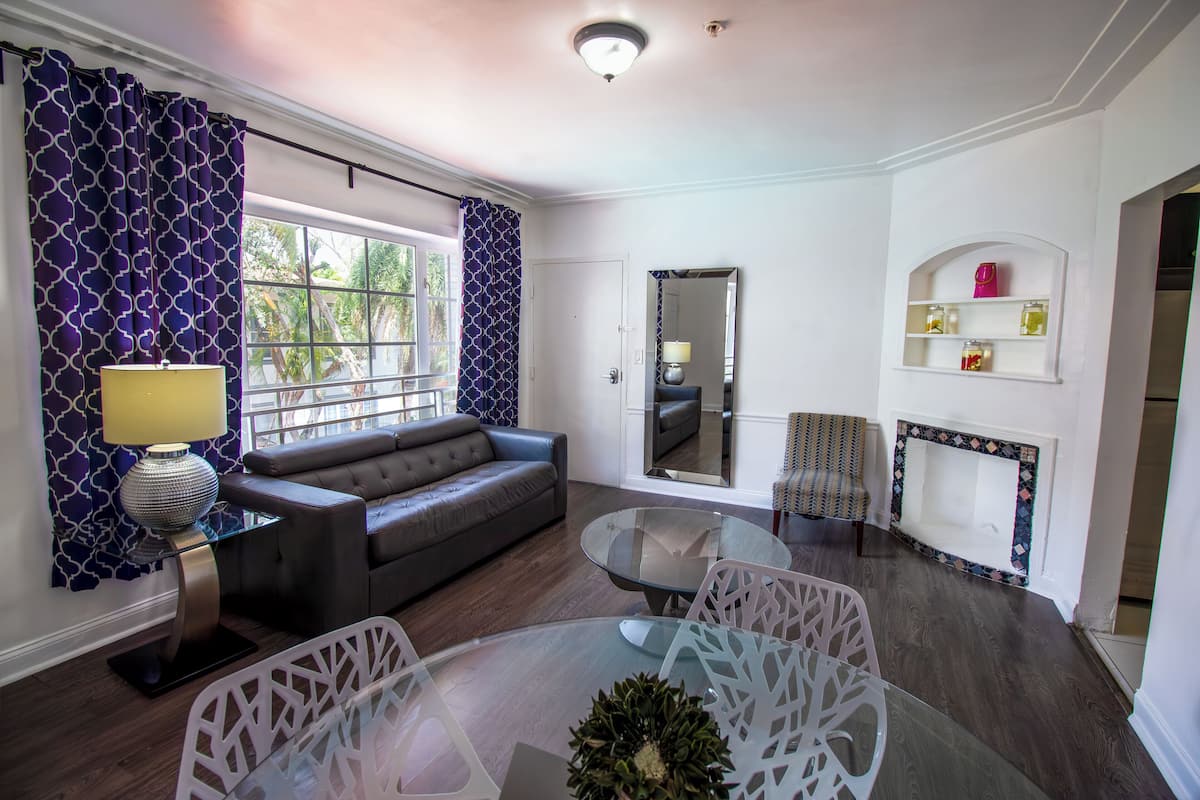 Club Apartment, 2 Bedrooms | Living area | 32-inch flat-screen TV with cable channels, TV