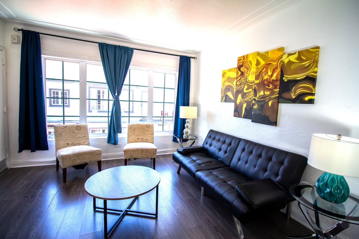 Apartment, 3 Bedrooms | Living area | 32-inch flat-screen TV with cable channels, TV