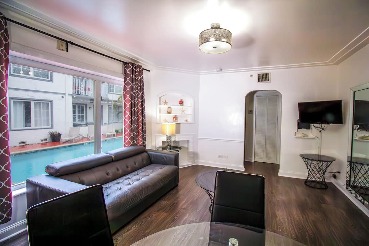 Comfort Apartment, 2 Bedrooms | Living area | 32-inch flat-screen TV with cable channels, TV