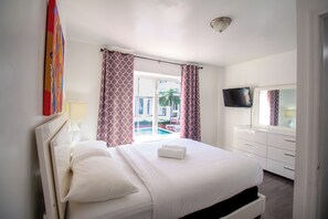 Family Apartment, 2 Bedrooms | In-room safe, desk, laptop workspace, iron/ironing board
