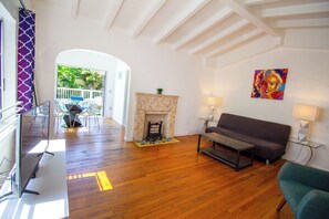 Premium Apartment, 1 Bedroom, Patio | Living area | 32-inch flat-screen TV with cable channels, TV - L'Etoile Apartments Part of the Oasis Casita Collection (Miami Beach)