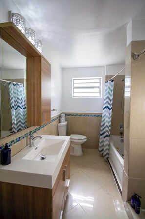 Apartment, 4 Bedrooms | Bathroom | Shower, free toiletries, hair dryer, towels