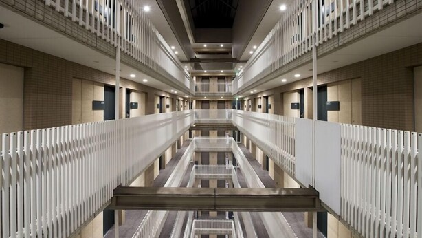 A modern hotel interior with a central atrium, multiple floors, and a symmetrical design. - Hotel Villa Fontaine Tokyo - Ueno Okachimachi (Tokyo)