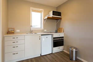 Cottage | Private kitchen | Fridge, microwave, stovetop, coffee/tea maker