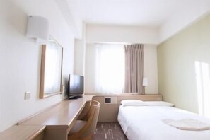 A hotel room with a bed, a desk, a television, and a window with curtains. - Hearton Hotel Shinsaibashi (Osaka)