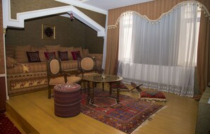 Luxury Suite, 1 King Bed, City View | Living room - Caspian Plaza (Baku)