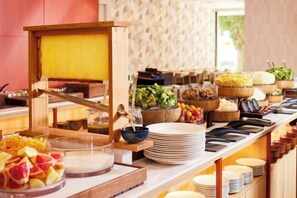 A buffet setup with various food items and a cheese grater. - HOTEL MYSTAYS Nagoya Sakae　Renewed in September 2026 – All Guest Rooms & Breakfast (NAGOYA)