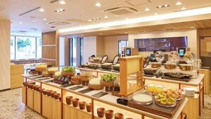 A buffet setup with various food items and serving dishes. - HOTEL MYSTAYS Nagoya Sakae　Renewed in September 2026 – All Guest Rooms & Breakfast (NAGOYA)