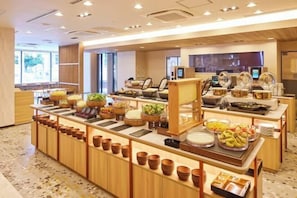 A buffet setup with various food items and serving dishes. - HOTEL MYSTAYS Nagoya Sakae　Renewed in September 2026 – All Guest Rooms & Breakfast (NAGOYA)