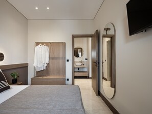 Apartment, 1 Bedroom, Partial Sea View | In-room safe, desk, blackout drapes, soundproofing