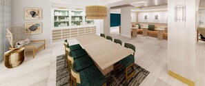Un comedor moderno con una larga mesa de madera, bancos tapizados en verde y una lámpara colgante de fibras naturales.