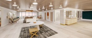 A spacious living area with a round dining table, a sofa, and a coffee table. There are multiple pendant lights and a large window providing natural light. - Bealhousefort Walton Beachfront Tapestrycollection (Fort Walton Beach)