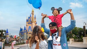 A theme park with a castle-like structure in the background. - Copper Creek Villas and Cabins at Disneys Wilderness Lodge (Lake Buena Vista)