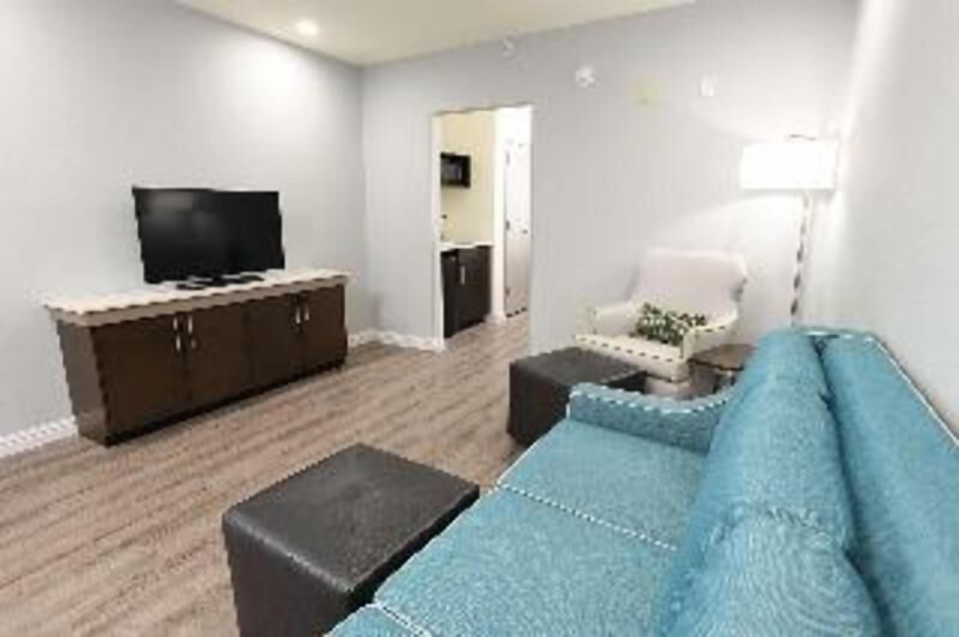 42-inch flat-screen TV with cable channels, TV
