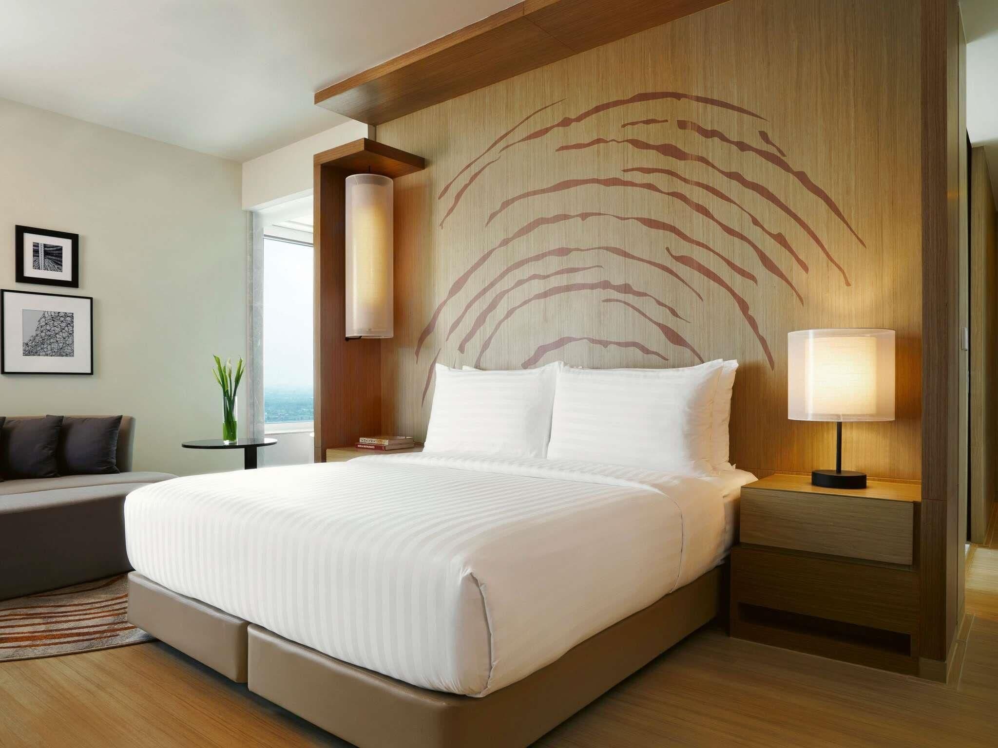 Suite Eksekutif, 1 Tempat Tidur King, pemandangan laut | Seprai katun Mesir, seprai premium, minibar, dan brankas