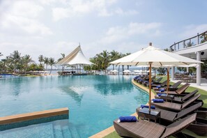 Outdoor pool, free cabanas, pool umbrellas