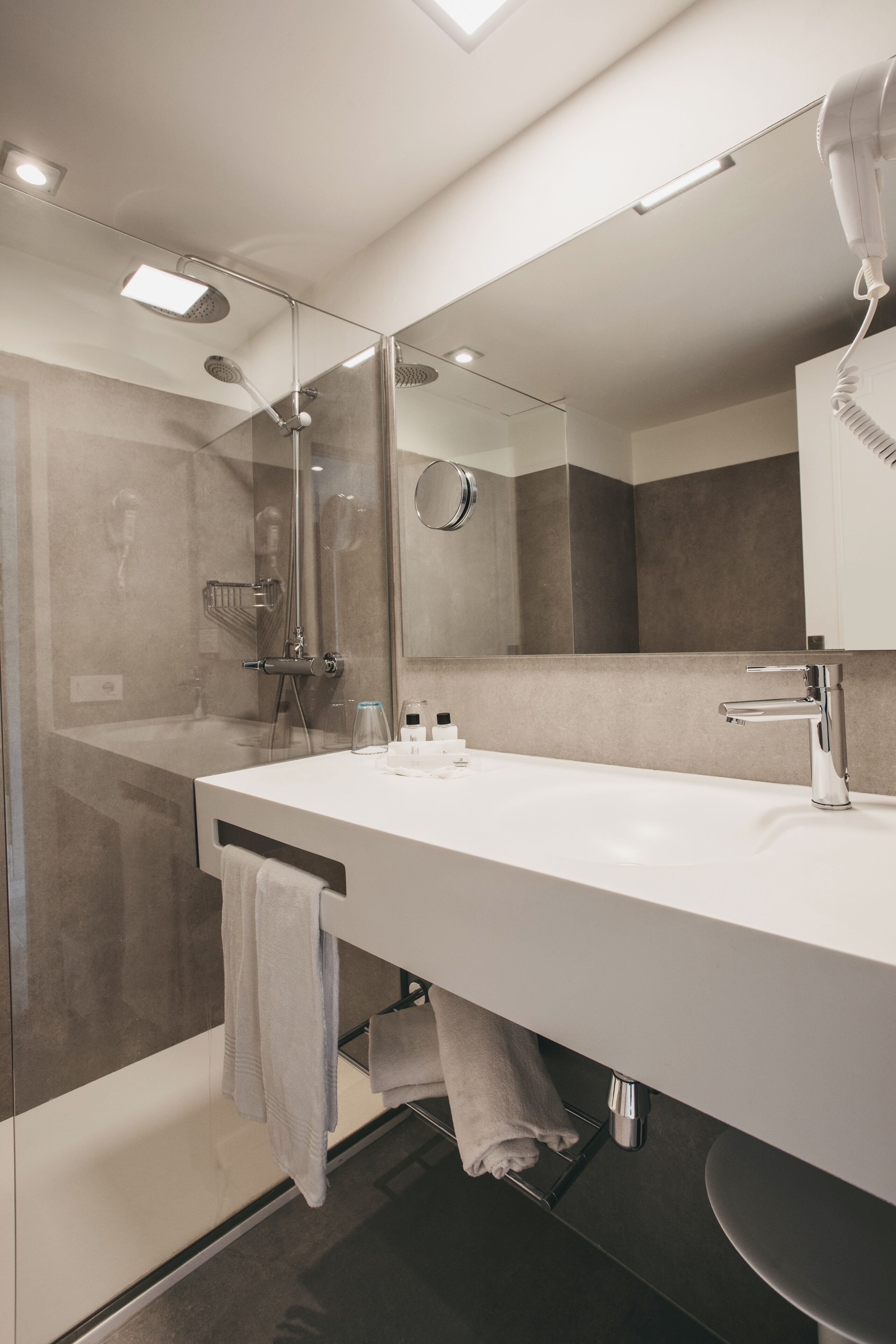 hair dryer, towels, soap, shampoo