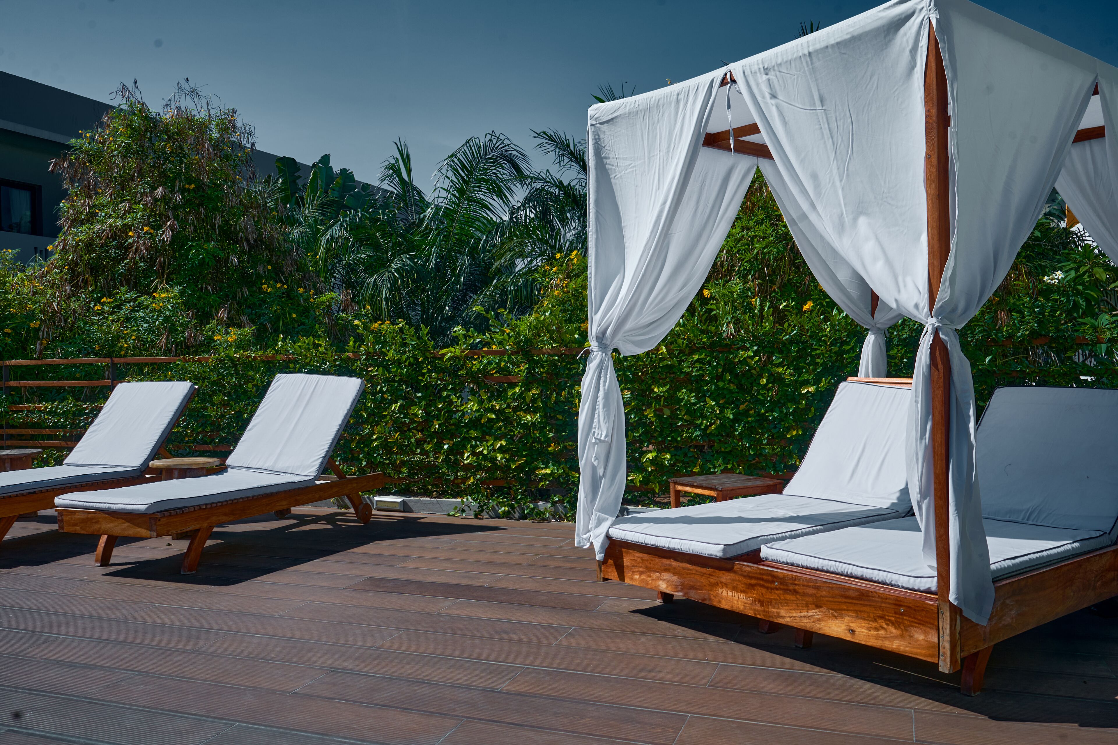 Outdoor pool, open 7:00 AM to 7:00 PM, pool umbrellas, sun loungers