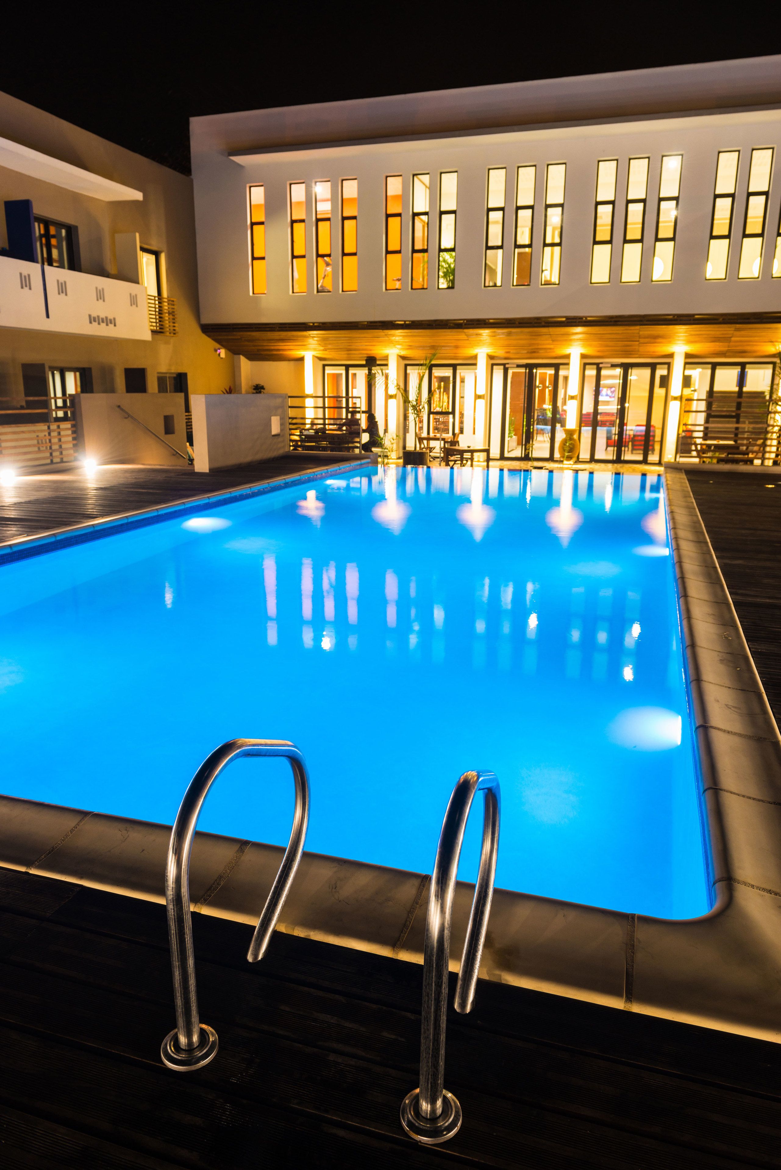 Outdoor pool, open 7:00 AM to 7:00 PM, pool umbrellas, pool loungers