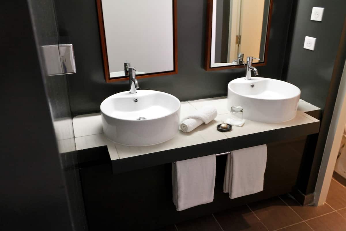 junior suite | bathroom | shower, rainfall showerhead, towels, soap