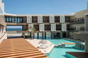 Outdoor pool, open 10:00 AM to 8:00 PM, pool umbrellas, sun loungers