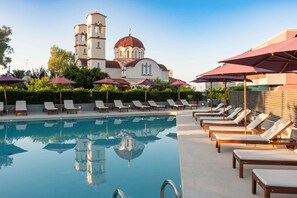 Outdoor pool, open 10:00 AM to 8:00 PM, pool umbrellas, sun loungers