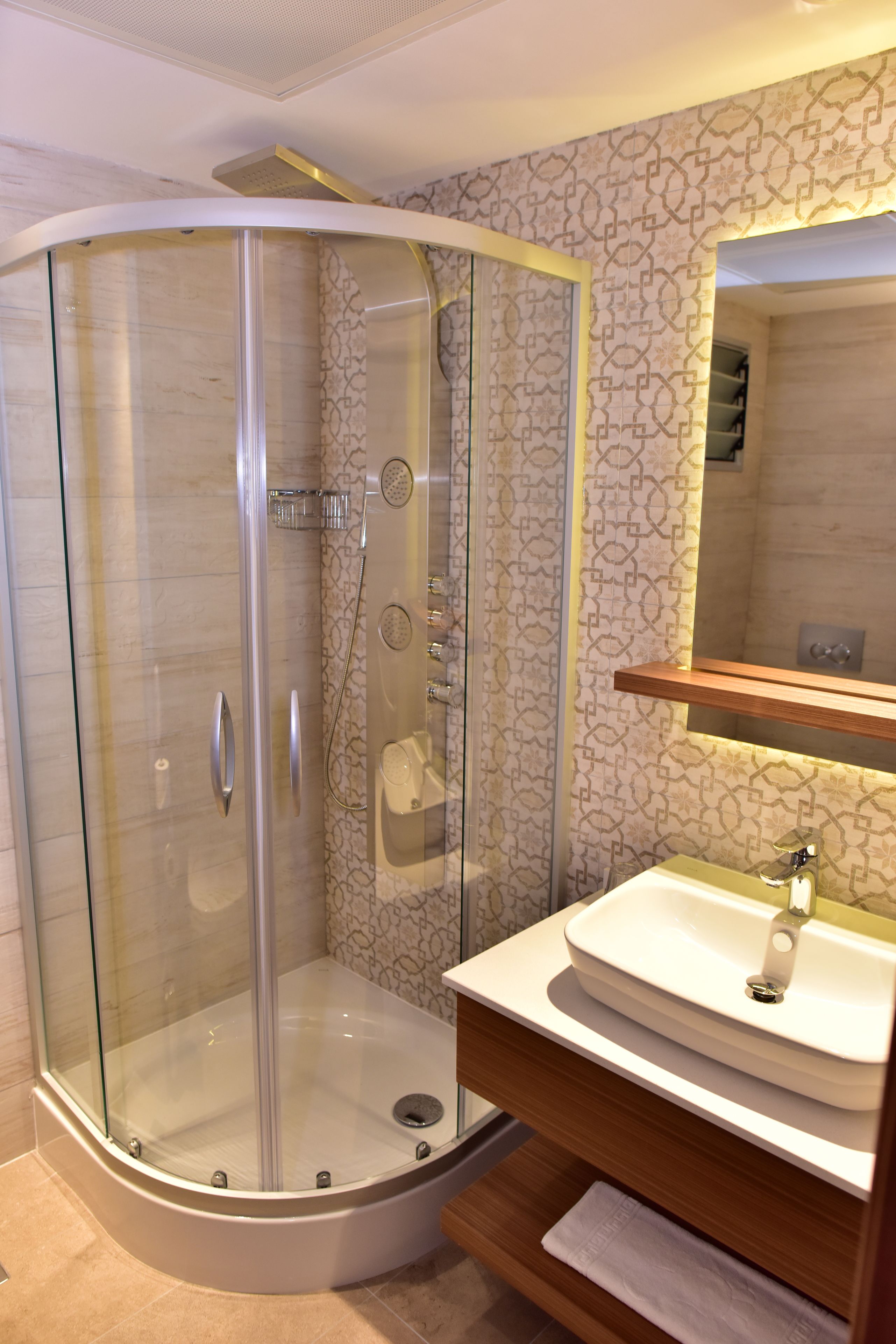 superior room | bathroom | shower, free toiletries, hair dryer, bathrobes