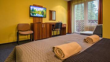 Desk, iron/ironing board, cribs/infant beds, rollaway beds