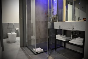 Economy Double Room | Bathroom | Shower, free toiletries, hair dryer, slippers