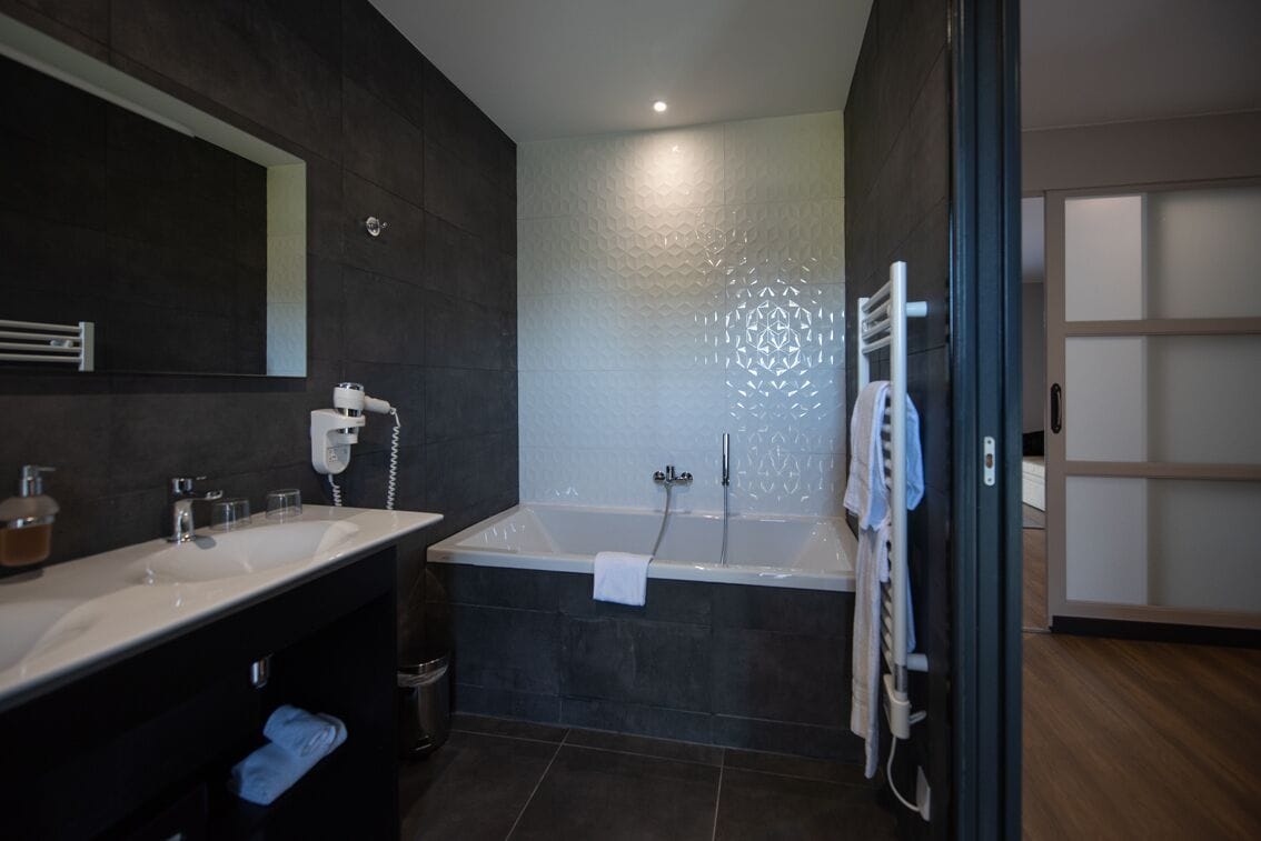 family room | bathroom | hair dryer, towels, soap, shampoo